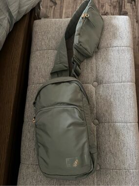 NWOT, Adidas  sling pack in  sage green .